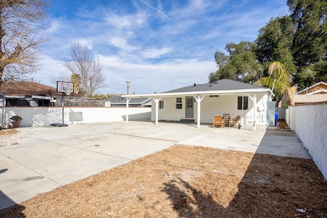 back of house featuring a patio