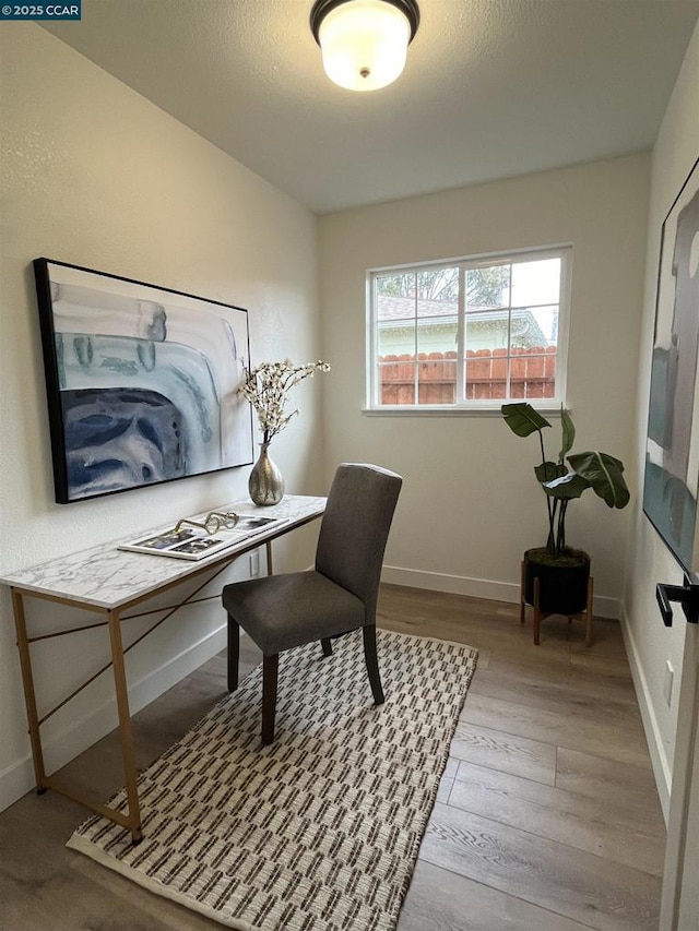 office area with light wood-type flooring