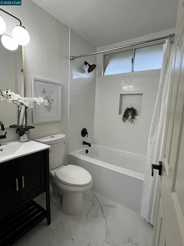 full bathroom with vanity, shower / tub combo, a textured ceiling, and toilet