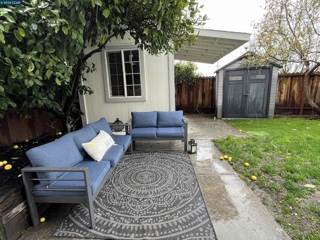 view of patio / terrace with a storage unit and outdoor lounge area