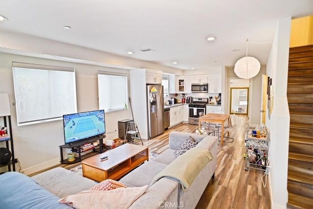 living room with light wood-type flooring