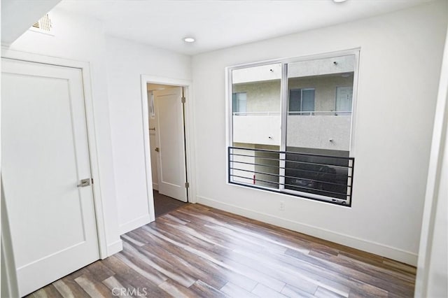 empty room with light wood-type flooring