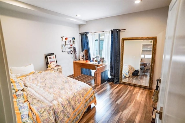 bedroom with wood-type flooring