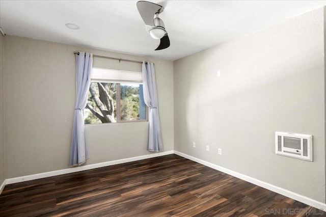 empty room featuring dark hardwood / wood-style floors