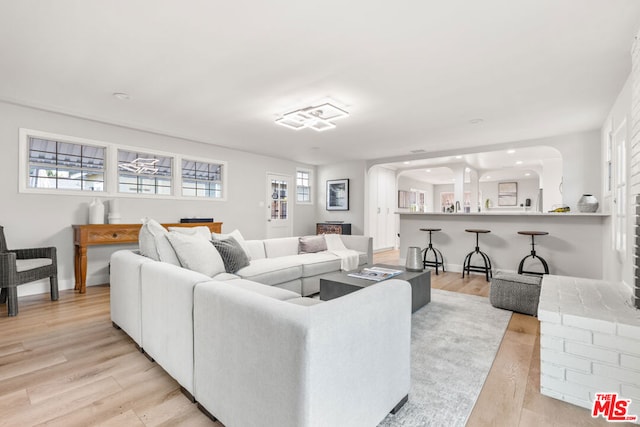 living room with light hardwood / wood-style floors