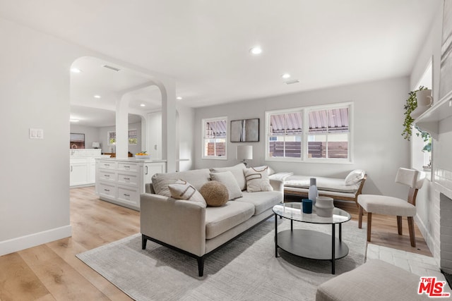 living room with light wood-type flooring