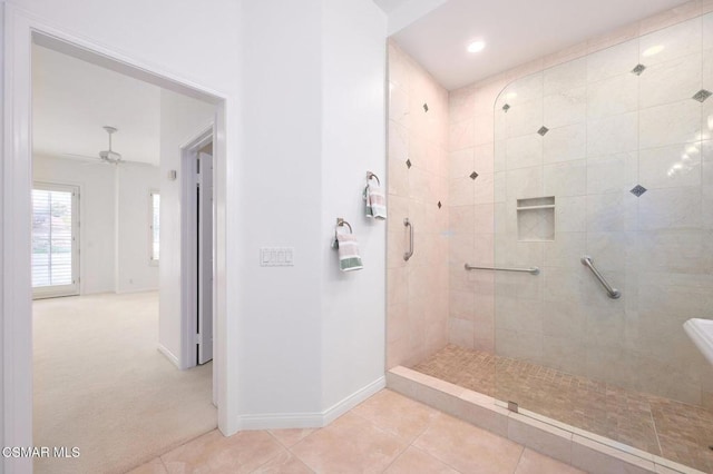 bathroom featuring tile patterned floors, ceiling fan, and walk in shower