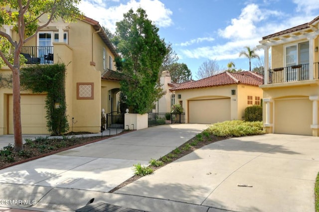 mediterranean / spanish house featuring a garage