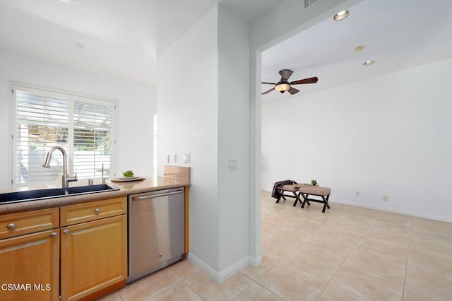 kitchen with light tile patterned flooring, ceiling fan, dishwasher, and sink