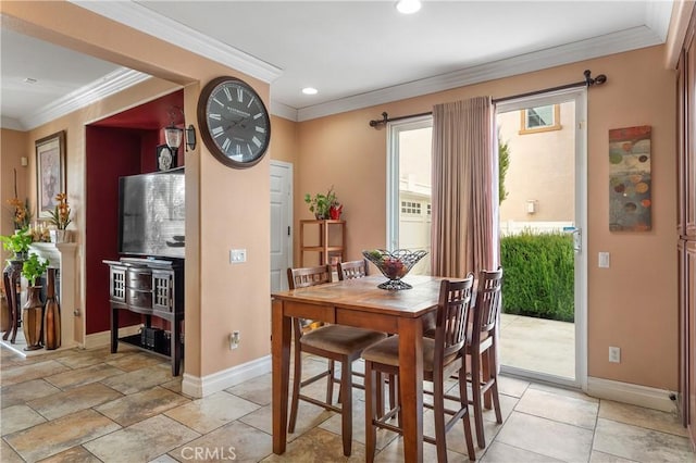 dining room with crown molding