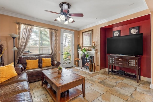 living room with crown molding and ceiling fan