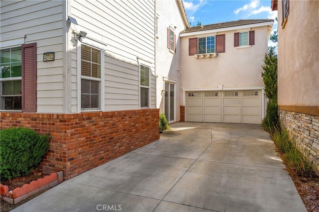 view of home's exterior featuring a garage