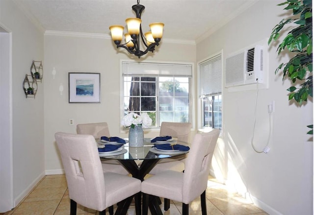 tiled dining space featuring crown molding, a wall unit AC, and a notable chandelier