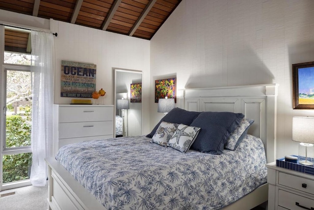 bedroom featuring lofted ceiling with beams, light carpet, wooden ceiling, and multiple windows