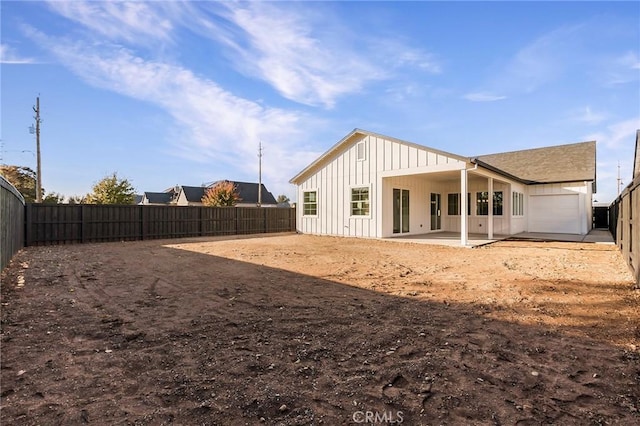 back of property featuring a patio area