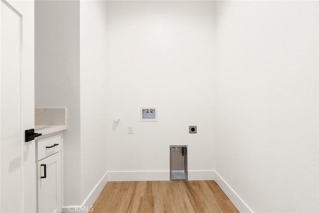 9 Harkness Ct, Chico, CA 95973 - laundry room featuring electric dryer hookup, light wood-type flooring, and hookup for a washing machine