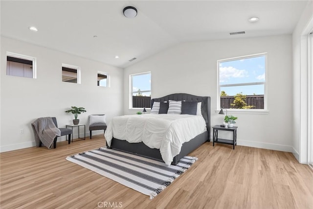 9 Harkness Ct, Chico, CA 95973 - bedroom featuring light wood-style flooring, vaulted ceiling, and recessed lighting