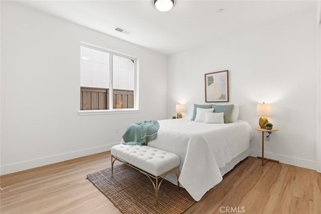 9 Harkness Ct, Chico, CA 95973 - bedroom featuring baseboards and light wood-style flooring