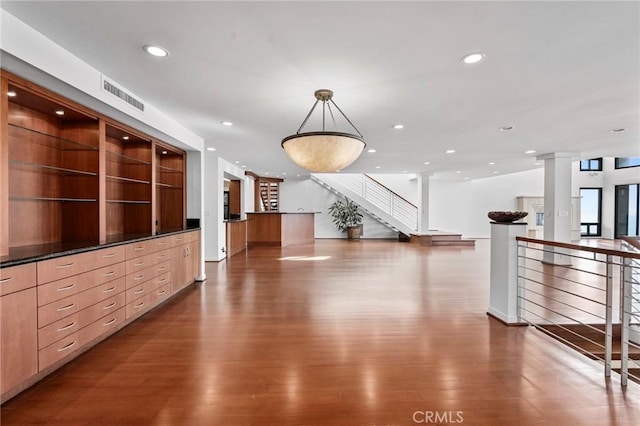 interior space featuring decorative columns