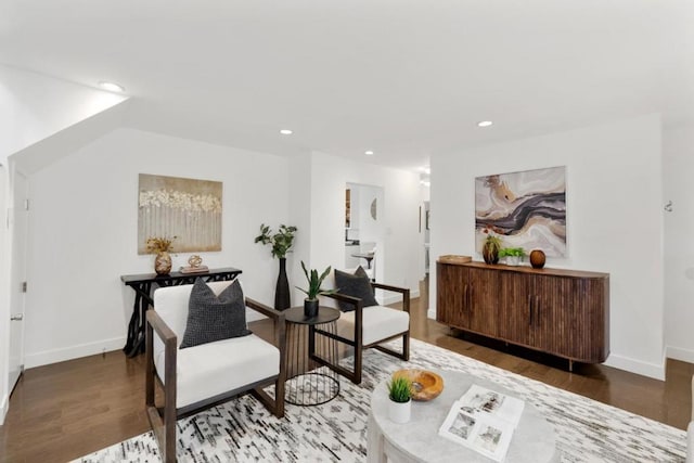 sitting room with hardwood / wood-style flooring