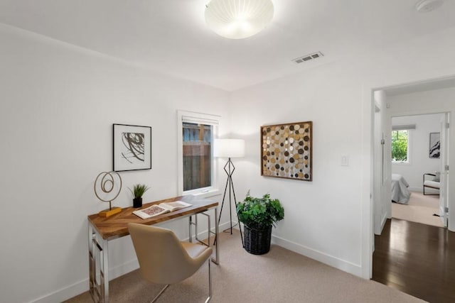 view of carpeted home office