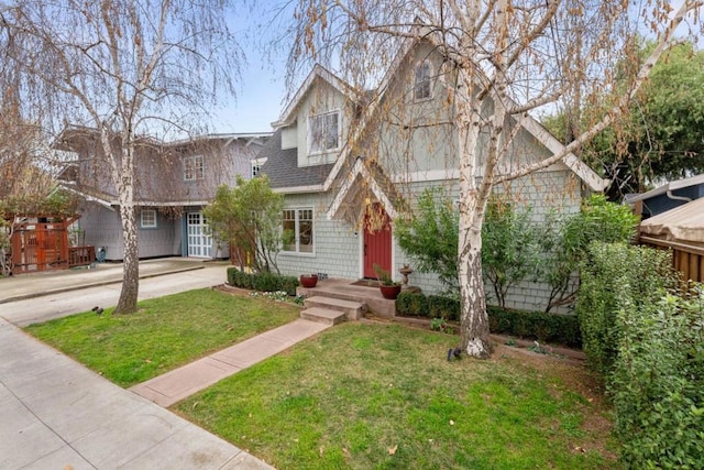 view of front of home with a front yard