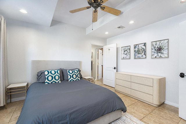 tiled bedroom with ceiling fan