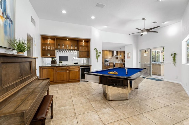 playroom featuring light tile patterned flooring, indoor bar, pool table, and wine cooler