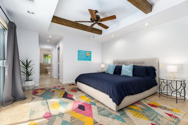 bedroom featuring beamed ceiling and ensuite bath