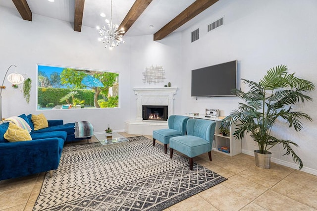 tiled living room featuring beamed ceiling, a high end fireplace, and a notable chandelier