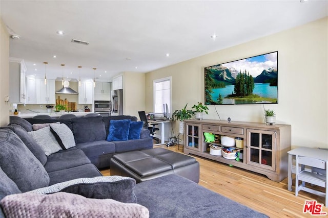 living room with light wood-type flooring