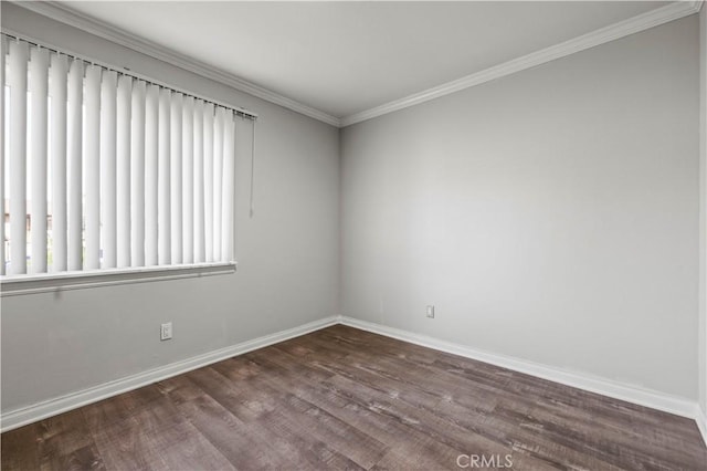 unfurnished room featuring ornamental molding and hardwood / wood-style floors