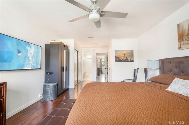 unfurnished bedroom with dark wood-type flooring and ceiling fan