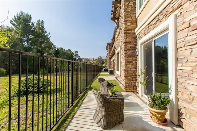 balcony with central AC unit