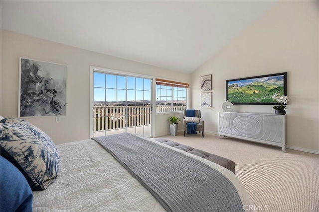 carpeted bedroom featuring vaulted ceiling