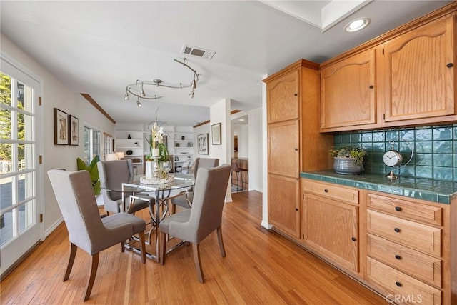 dining room featuring light hardwood / wood-style floors