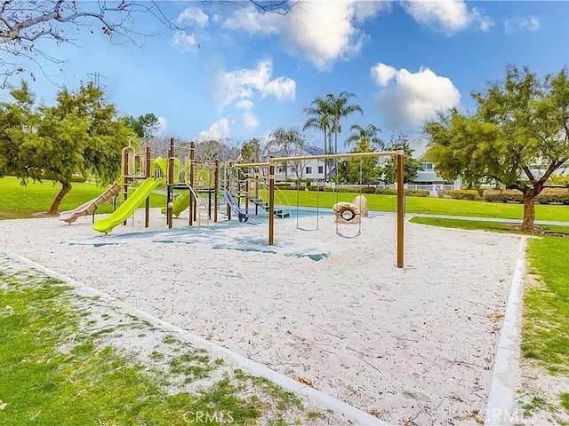 view of playground featuring a lawn