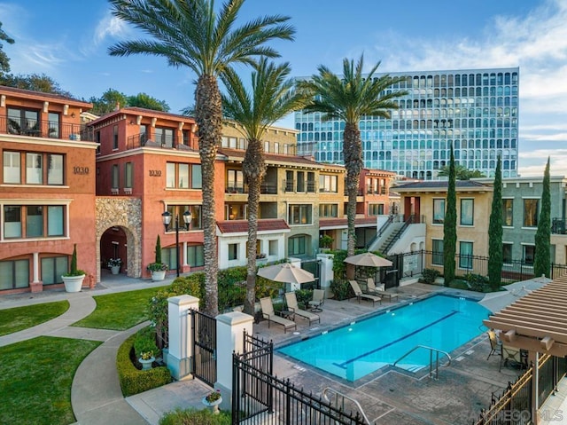 view of swimming pool with a patio area