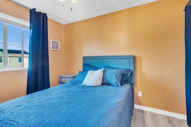 bedroom featuring light wood-type flooring