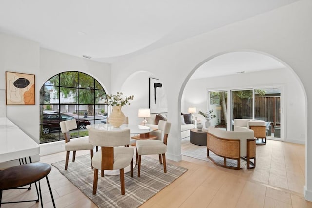 dining area with light wood-type flooring