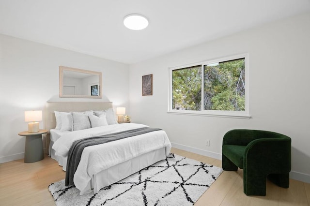 bedroom featuring light wood-type flooring