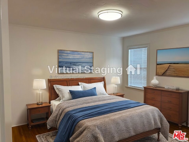 bedroom featuring dark wood-type flooring and ornamental molding