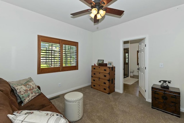 sitting room with light carpet and ceiling fan