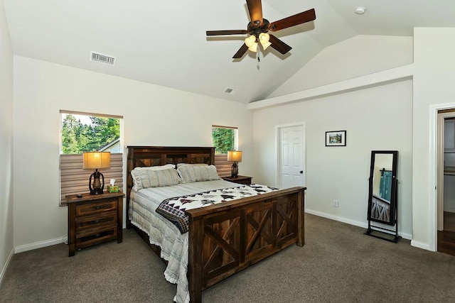 bedroom with vaulted ceiling, ceiling fan, and dark colored carpet