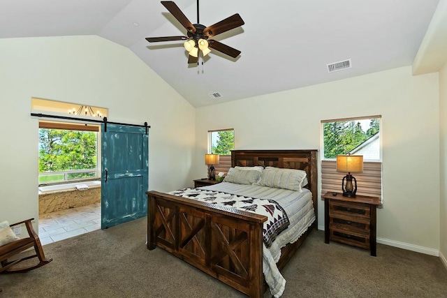 bedroom with carpet floors, high vaulted ceiling, a barn door, and ceiling fan