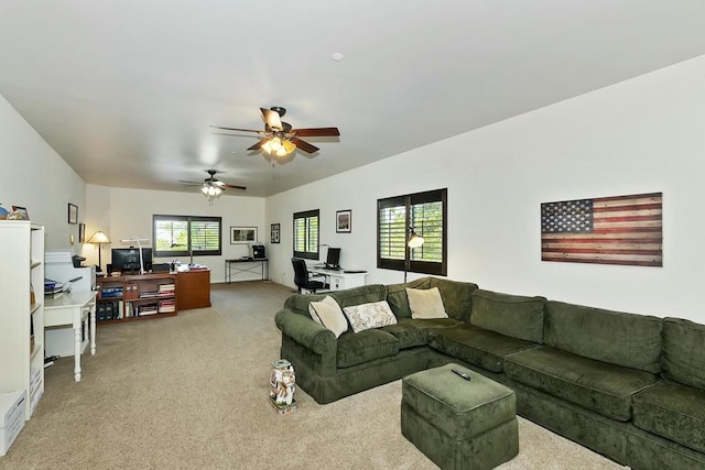 living room with light carpet and ceiling fan