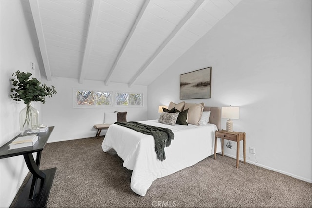 bedroom featuring lofted ceiling with beams and dark colored carpet