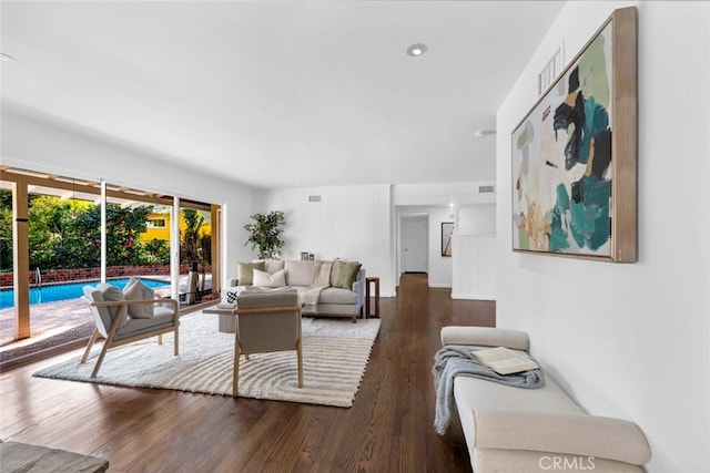 living room featuring dark hardwood / wood-style floors