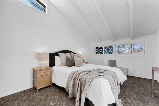 carpeted bedroom with vaulted ceiling with beams