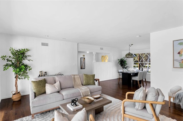 living room with dark wood-type flooring